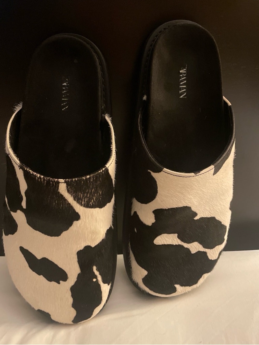 Black & White Cowhide Slip-On Clogs